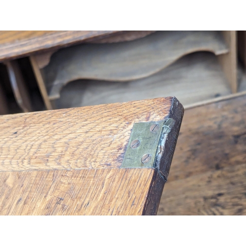 928 - An Early 20th Century Arts & Crafts inlaid oak writing bureau. Circa 1900. 100x43x111cm