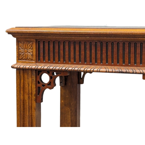 955 - An ornate end table. 67.5x55x58.5cm