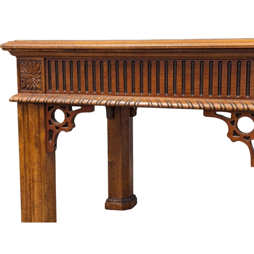 956 - An ornate end table. 67x58.5cm