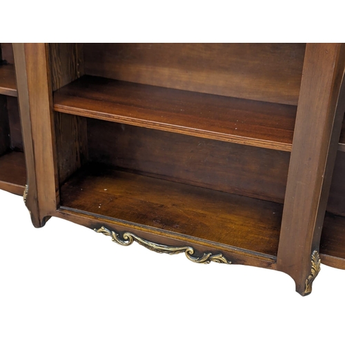 966 - An 18th Century style mahogany open breakfront bookcase. 152x38x102cm