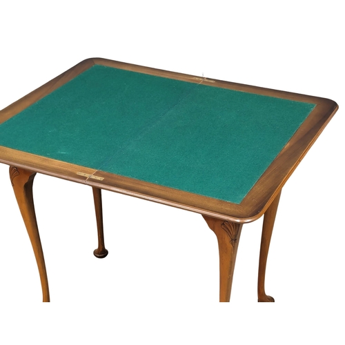 968 - An Early 20th Century burr walnut games table. Circa 1920s-1930s. 76.5x46.574cm