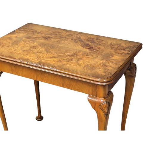 968 - An Early 20th Century burr walnut games table. Circa 1920s-1930s. 76.5x46.574cm