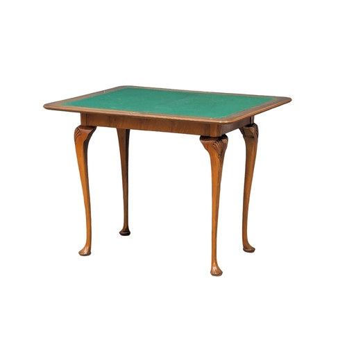 968 - An Early 20th Century burr walnut games table. Circa 1920s-1930s. 76.5x46.574cm