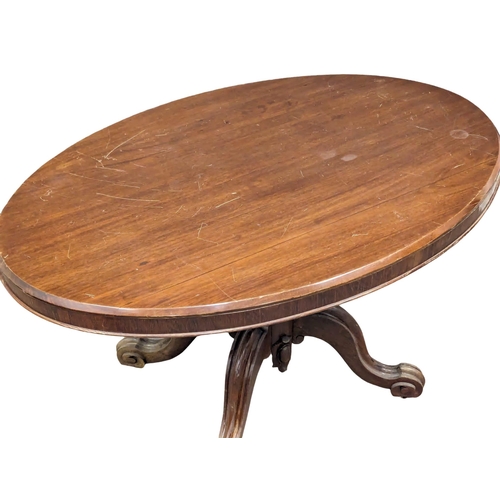 970 - A Victorian mahogany tilt top breakfast table. 131x89x76cm