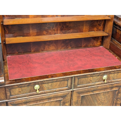 974 - A Mid Victorian mahogany pedestal sideboard with writing compartment. Circa 1860s. 217cm