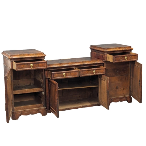 974 - A Mid Victorian mahogany pedestal sideboard with writing compartment. Circa 1860s. 217cm