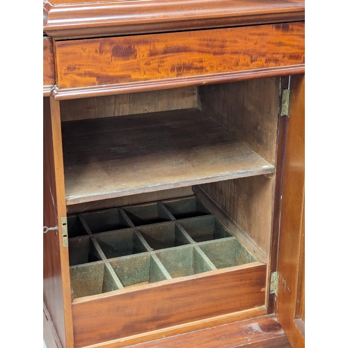 987 - A large Victorian mahogany pedestal sideboard. 234x68.5x145.5cm