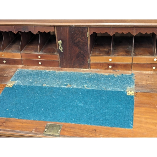 990 - A Georgian mahogany bureau. Circa 1800. With Late Victorian handles. 120x51x109cm