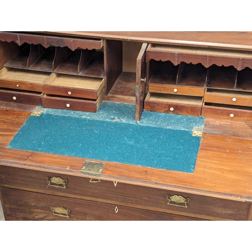 990 - A Georgian mahogany bureau. Circa 1800. With Late Victorian handles. 120x51x109cm