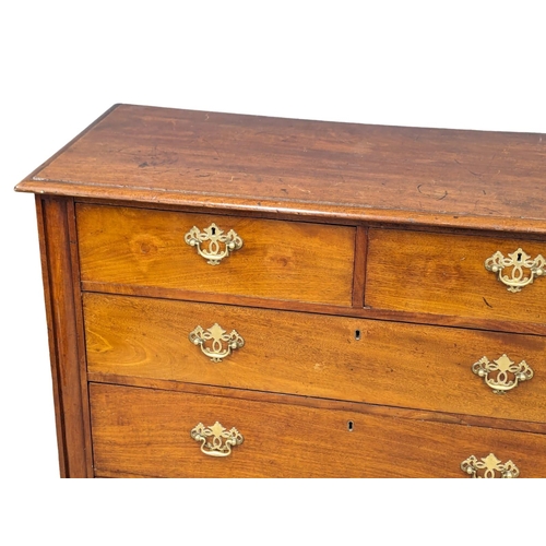 992 - A Late 19th Century walnut chest of drawers on bracket feet. 126x55x104cm