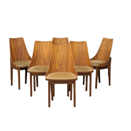 993 - A Mid Century dining table and 6 chairs. 139x78.5cm