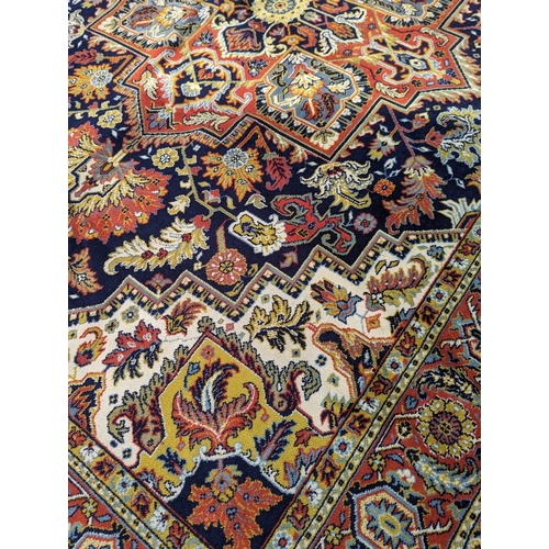 998 - A large vintage rug. 351x250cm