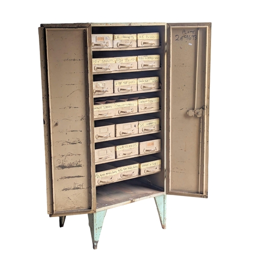 999 - A large Early 20th Century industrial storage cabinet with enclosed drawers and original paintwork. ... 