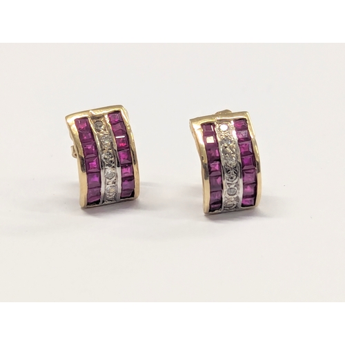 540G - A pair of 9ct gold, ruby and diamond earrings. 1.47g