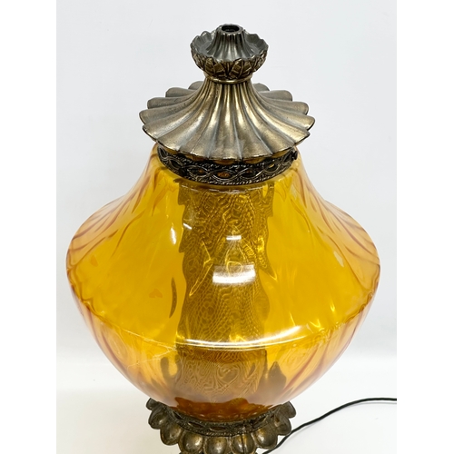 688 - A large Falkenstein ornate brass table lamp. 61cm