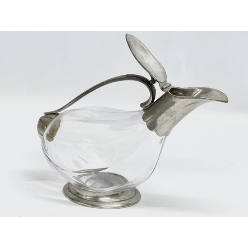 689 - A French crystal and pewter ‘duck’ claret decanter. Wit & Wine. Etain. 28x19cm