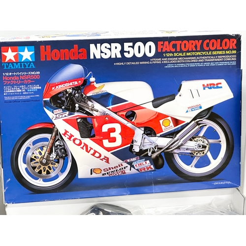 637D - 2 Tamiya model kits. A Tamiya Honda NSR 500. A Tamiya Suzuki RGV-1.