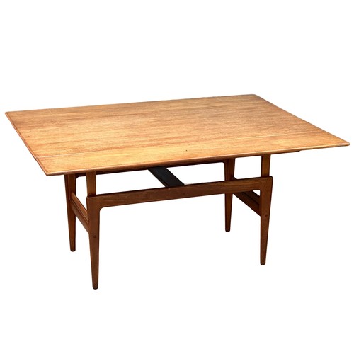 895 - A Danish Mid Century teak ‘Elevator’ table designed by Kai Kristensen. Coffee table/dining table. Di... 