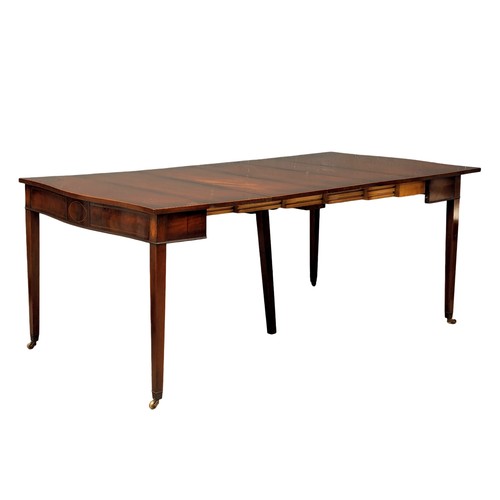 954 - A Sheraton style inlaid mahogany turnover tea table/dining table