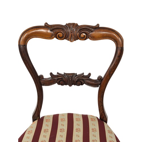 1013 - A set of 3 Victorian rosewood balloon back chairs on Cabriole legs