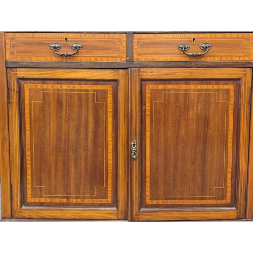 1020 - An Early 20th Century Sheraton Revival inlaid mahogany bookcase. Circa 1900. 91x41x200cm