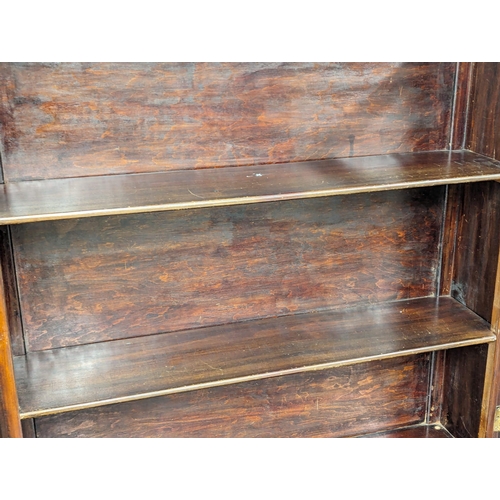 1020 - An Early 20th Century Sheraton Revival inlaid mahogany bookcase. Circa 1900. 91x41x200cm