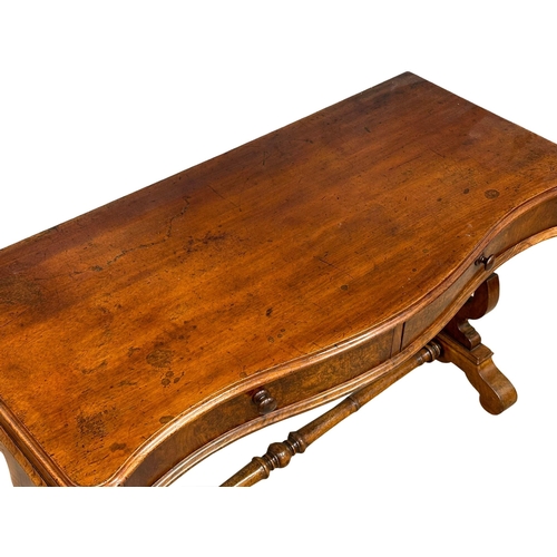 1021 - A Victorian mahogany Serpentine front side table with 2 drawers and stretcher support. 115x51x72.5cm