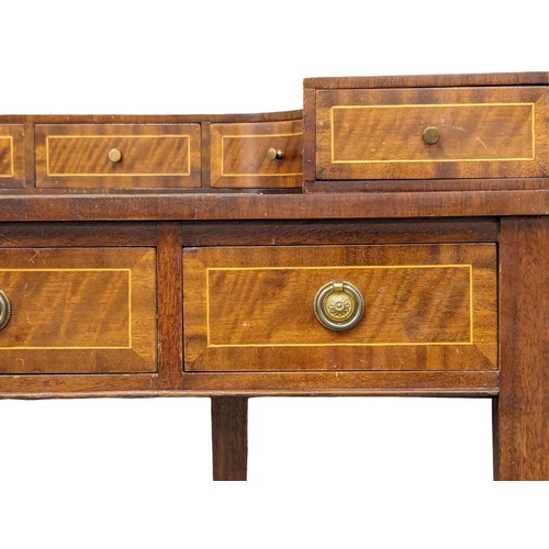 1025 - A Carlton House style inlaid mahogany writing desk with leather top in the manner of Sheraton 116x57... 