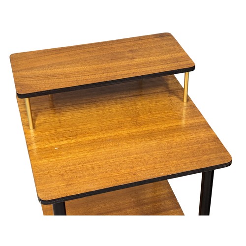 1028 - A pair of 1960s Mid Century teak 3 tiered side tables. 37.5x37x57cm