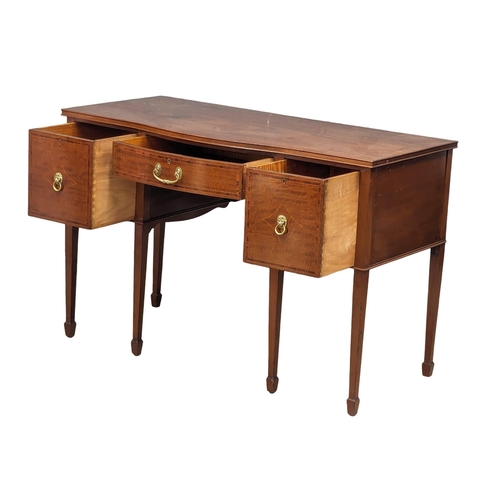 1031 - An Early 20th Century Sheraton Revival inlaid mahogany Serpentine front desk / side table. 122x57.5x... 