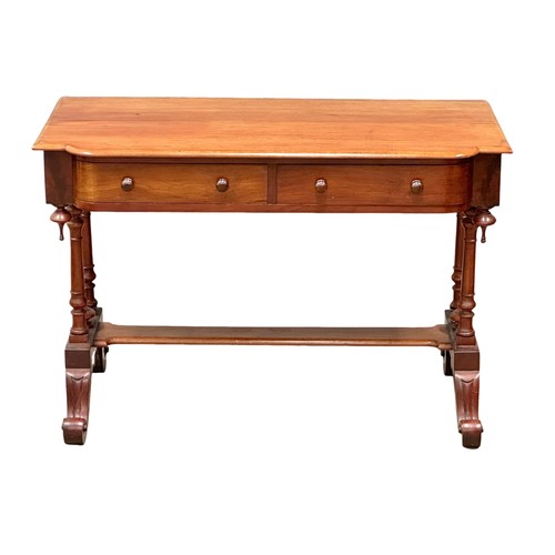 1043 - A Victorian mahogany 2 drawer side table on cabriole legs. Circa 1870. 106x53x72cm