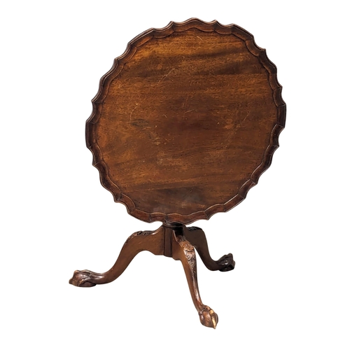 1049 - A George III style mahogany snap top pedestal table. 61x50cm