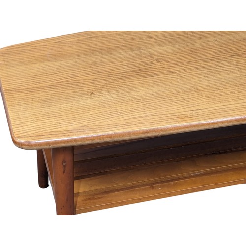 1056 - A Mid Century 2 tiered coffee table. 104.5x43x39cm