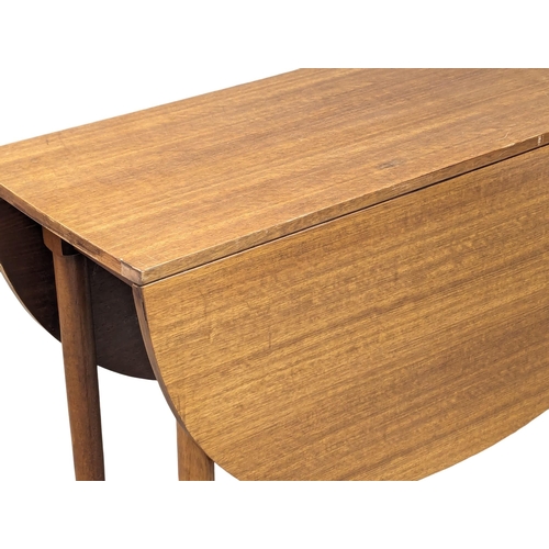 960 - A G-Plan Mid Century teak drop leaf dining. Extended 132x108x72.5cm