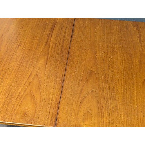 1058 - A Mid Century teak extending dining table by Beithcraft. Extended 213.5x92x76cm