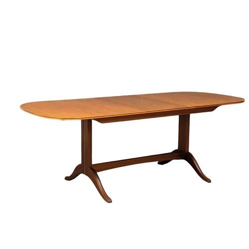 1058 - A Mid Century teak extending dining table by Beithcraft. Extended 213.5x92x76cm