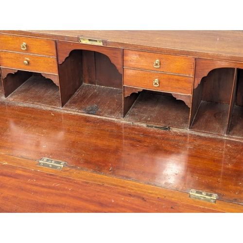 1060 - A large George III Sheraton style inlaid mahogany writing bureau. Circa 1800. 121x53x108cm