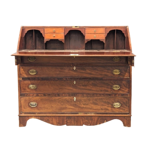 1060 - A large George III Sheraton style inlaid mahogany writing bureau. Circa 1800. 121x53x108cm