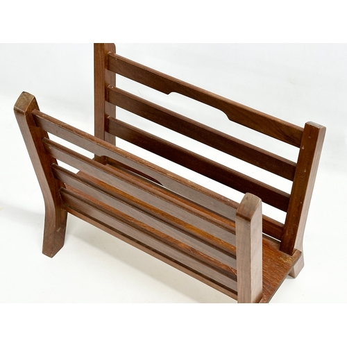 1061 - A Mid Century teak magazine rack. 40x21x33cm