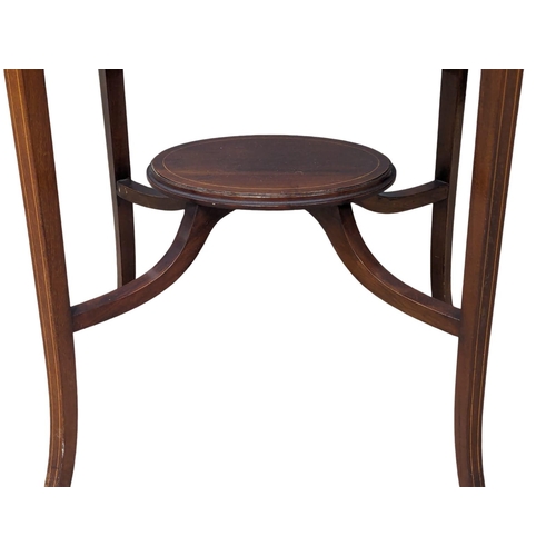 1065 - An Edwardian inlaid mahogany side table. 65x47x72cm