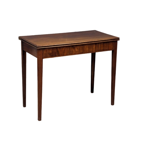 1072 - A George III mahogany tea table with square tapering legs, circa 1800. 90cm x 45cm x 73cm