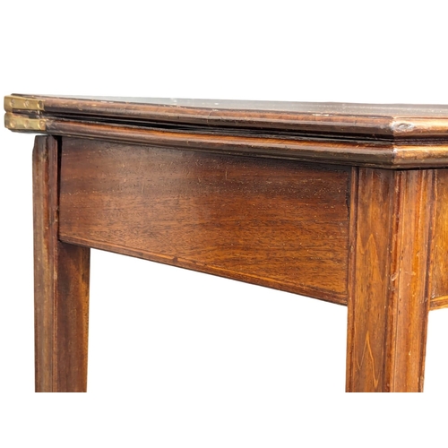 1072 - A George III mahogany tea table with square tapering legs, circa 1800. 90cm x 45cm x 73cm