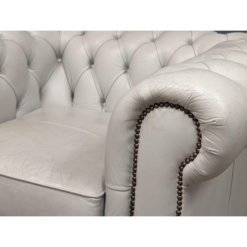 1075 - A deep button club style armchair