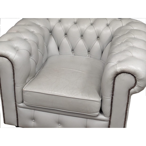 1075 - A deep button club style armchair