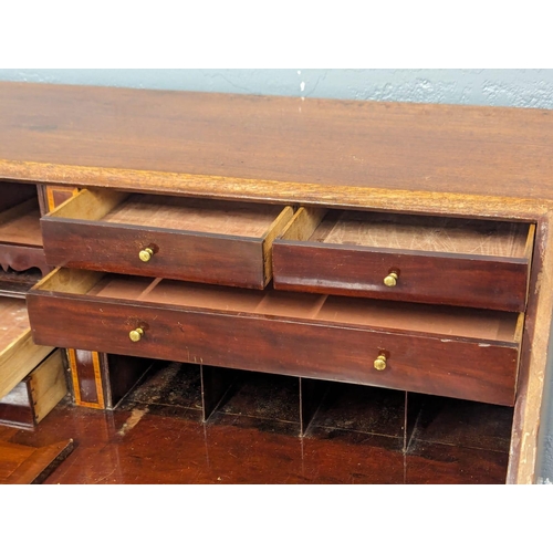 1080 - A George III inlaid mahogany writing bureau. Circa 1800. 119x58x111.5cm