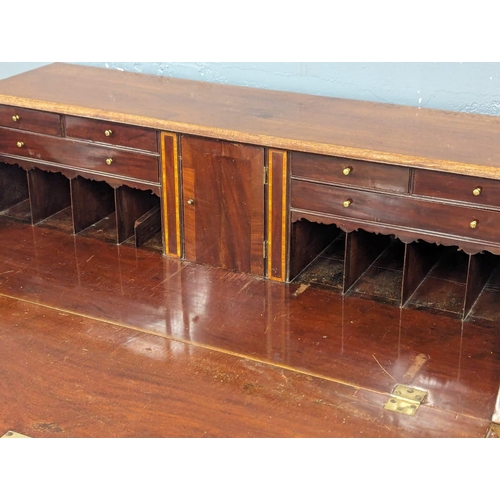 1080 - A George III inlaid mahogany writing bureau. Circa 1800. 119x58x111.5cm