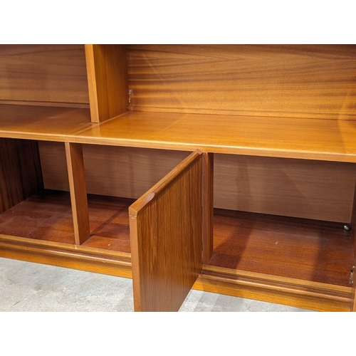 1084 - A large Mid Century teak 2 piece living room unit, by Morris of Glasgow. 183x48x171.5cm