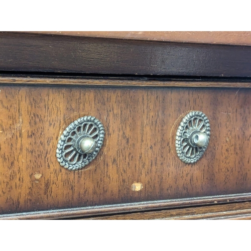 1087 - A mahogany writing desk/sofa table with leather top, 3 drawers, 3 dummy drawers and lion paw feet ca... 