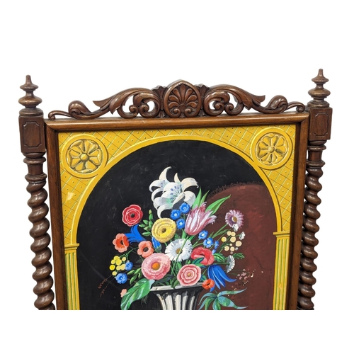 1088 - A mid Victorian fire screen, circa 1850s. 84cm x 46cm x 117.5cm