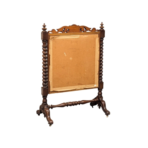 1088 - A mid Victorian fire screen, circa 1850s. 84cm x 46cm x 117.5cm